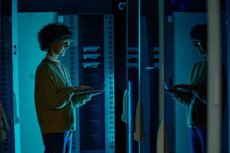 Engineer,Standing,In,Data,Center