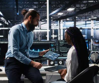 System,Administrator,And,Employee,In,Data,Center,Coding,With,Generative