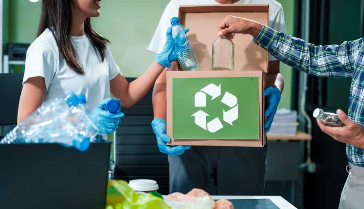 In,An,Office,,An,Asian,Team,Discusses,Waste,Management,Strategies