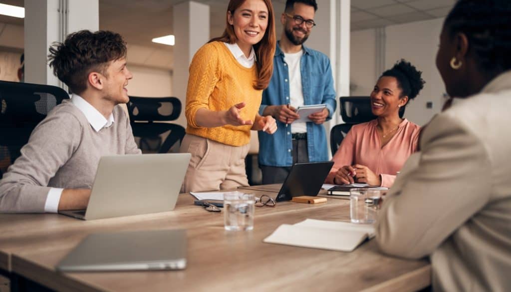 A,Group,Of,Office,Professionals,Engaged,In,A,Lively,Discussion
